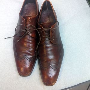 Prada wingtip lace up shoes